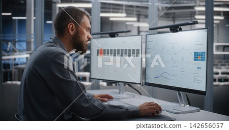 Data Center Engineer Taking Immediate Action During Detected Cyber Attack Data Center Engineer Taking Immediate Action During Detected Cyber Attack 142656057