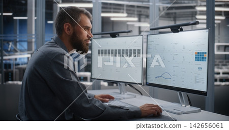 Data Center Engineer Taking Immediate Action During Detected Cyber Attack Data Center Engineer Taking Immediate Action During Detected Cyber Attack 142656061