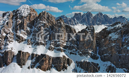 Majestic rocky mountains in snow Alps Dolomites Majestic rocky mountains in snow Alps Dolomites 142656072