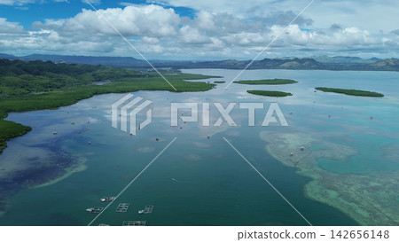 Fish farm with cages for fish and shrimp Fish farm with cages for fish and shrimp 142656148