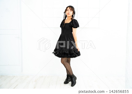 Woman in Gothic Lolita attire Woman in Gothic Lolita attire 142656855