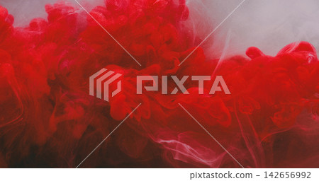 Steam paint splash. Mix color cloud. Defocused red white fog particles smoke glitter water spreading on acrylic abstract background. Steam paint splash. Mix color cloud. Defocused red white fog particles smoke glitter water spreading on acrylic abstract background. 142656992