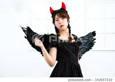 A woman who makes a demon's cosplay A woman who makes a demon's cosplay 142657210