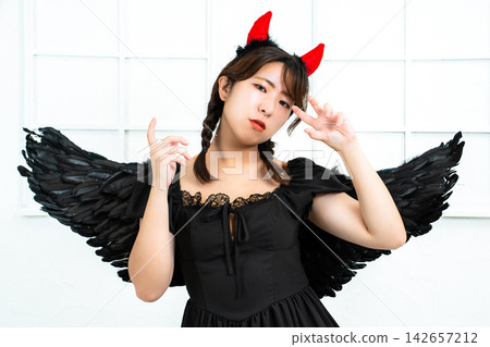 A woman who makes a demon's cosplay A woman who makes a demon's cosplay 142657212