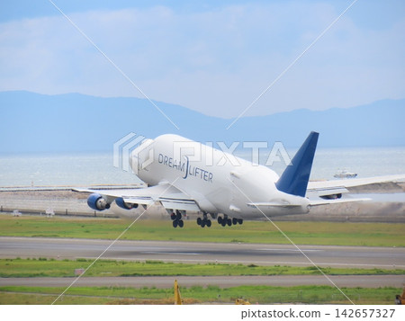 A large cargo plane taking off 142657327