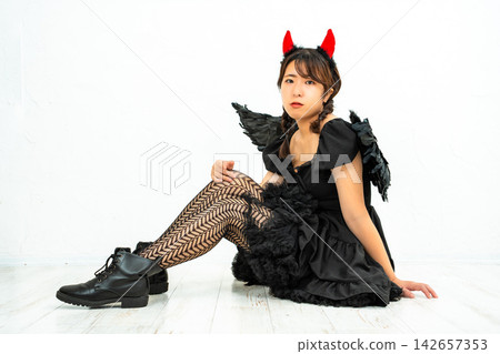 A woman who makes a demon's cosplay A woman who makes a demon's cosplay 142657353