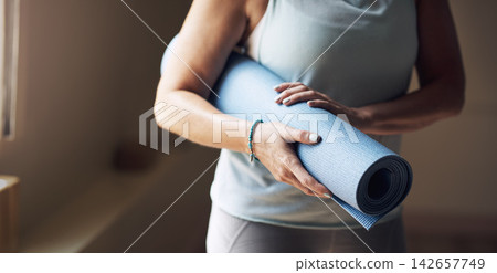 Yoga, woman hands and mat for fitness, meditation and ready for spiritual awareness exercise. Female person, self care and equipment for pilates or stretching in studio, mindfulness and gear for calm Yoga, woman hands and mat for fitness, meditation and ready for spiritual awareness exercise. Female person, self care and equipment for pilates or stretching in studio, mindfulness and gear for calm 142657749