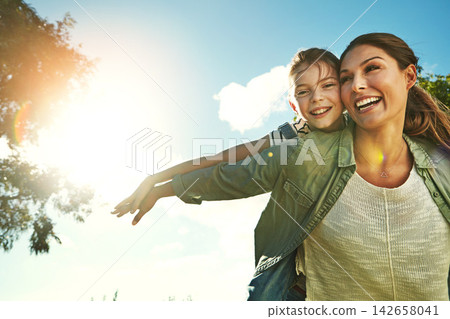 Mom, flying airplane and girl in outdoor park with blue sky for game, fun and bonding together. Nature, young daughter and happy mother for playing, summer vacation or weekend break in Australia 142658041