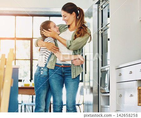 Happy, mom and daughter in home with hug, connection and kindness for bonding together on weekend. Parent, child and embrace in apartment with smile, maternal affection and gratitude on mothers day. Happy, mom and daughter in home with hug, connection and kindness for bonding together on weekend. Parent, child and embrace in apartment with smile, maternal affection and gratitude on mothers day. 142658258