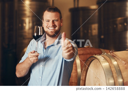 Portrait, man and glass of wine with thumbs up, thank you and agreement with smile in distillery. Male sommelier, happy and excited with hand gesture, beverage or satisfaction after tasting or drink Portrait, man and glass of wine with thumbs up, thank you and agreement with smile in distillery. Male sommelier, happy and excited with hand gesture, beverage or satisfaction after tasting or drink 142658888