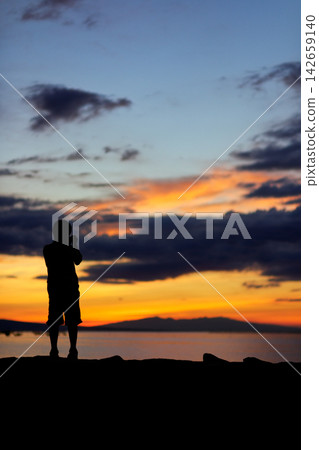 Evening view of the Osabeta Seashore Road | The setting sun and solitude sinking into the Ariake Sea Evening view of the Osabeta Seashore Road | The setting sun and solitude sinking into the Ariake Sea 142659140