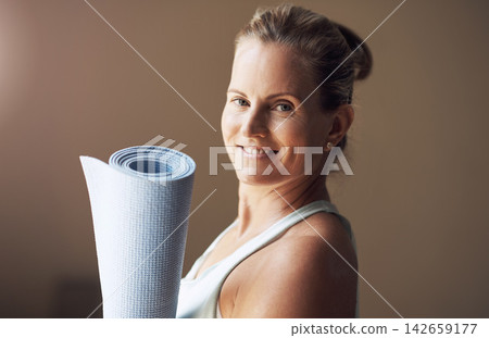 Yoga instructor, portrait and woman with mat before class, session and promoting business in studio. Smile, female coach and equipment for exercise, wellness and training for meditation and balance Yoga instructor, portrait and woman with mat before class, session and promoting business in studio. Smile, female coach and equipment for exercise, wellness and training for meditation and balance 142659177