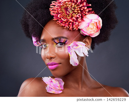 Flowers, portrait and salon with afro black woman in studio on dark background for natural cosmetics. Face, beauty or skincare and young model with protea in hair for aesthetic wellness at spa Flowers, portrait and salon with afro black woman in studio on dark background for natural cosmetics. Face, beauty or skincare and young model with protea in hair for aesthetic wellness at spa 142659229