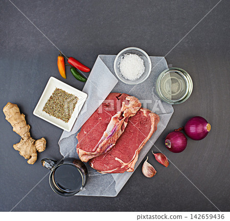 Nutrition, healthy and food with meat, cut and spices in kitchen or studio. Organic, eating and recipe for wellness, health and cuisine with fresh, ingredients for cooking or meal preparation Nutrition, healthy and food with meat, cut and spices in kitchen or studio. Organic, eating and recipe for wellness, health and cuisine with fresh, ingredients for cooking or meal preparation 142659436