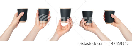Hand holding a black paper coffee cup. Clean studio lighting, texture, isolated on transparent background. Perfect for branding, packaging, and advertising use Hand holding a black paper coffee cup. Clean studio lighting, texture, isolated on transparent background. Perfect for branding, packaging, and advertising use 142659942