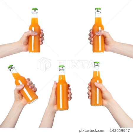 Set of Hands holding a glass bottle filled with orange juice, isolated on transparent background. Suitable for food, drink, freshness, citrus, and healthy lifestyle projects Set of Hands holding a glass bottle filled with orange juice, isolated on transparent background. Suitable for food, drink, freshness, citrus, and healthy lifestyle projects 142659947