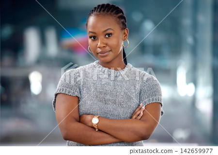 Portrait, arms crossed and black woman in office for business, career or pride at startup workplace at night. Face, confidence and African professional, creative entrepreneur and designer in Kenya Portrait, arms crossed and black woman in office for business, career or pride at startup workplace at night. Face, confidence and African professional, creative entrepreneur and designer in Kenya 142659977