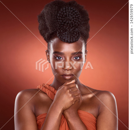 Portrait, makeup and beauty of confident black woman in studio for wellness, skincare or aesthetic isolated on red background. Face, fashion and cosmetics of serious African model for shine or glow Portrait, makeup and beauty of confident black woman in studio for wellness, skincare or aesthetic isolated on red background. Face, fashion and cosmetics of serious African model for shine or glow 142659979