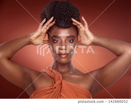 Hairstyle, confidence and portrait of African woman in studio for pride, culture and braids with hands and healthy texture. Black female person, self care and heritage of hair for shine and glow Hairstyle, confidence and portrait of African woman in studio for pride, culture and braids with hands and healthy texture. Black female person, self care and heritage of hair for shine and glow 142660052