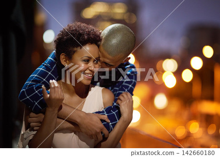 Happy couple, hug and city street at night or travel downtown date for relationship, bokeh or evening. Man, woman and embrace in New York for holiday adventure or sightseeing trip, love or marriage Happy couple, hug and city street at night or travel downtown date for relationship, bokeh or evening. Man, woman and embrace in New York for holiday adventure or sightseeing trip, love or marriage 142660180