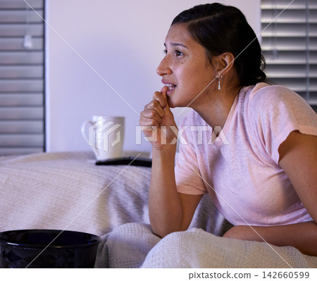 Woman, watching tv and fear in home, night and biting nails on sofa for horror, movies or show in living room. Girl, relax and television in lounge with streaming, subscription and scared of film Woman, watching tv and fear in home, night and biting nails on sofa for horror, movies or show in living room. Girl, relax and television in lounge with streaming, subscription and scared of film 142660599