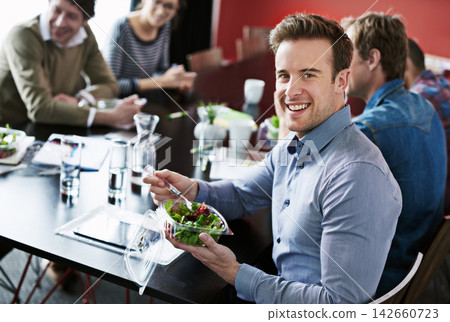 Office, food and portrait of woman in meeting with salad and team with lunch, and energy for productivity. Coworking, employee and girl with healthy meal and eating with friends in work or cafeteria Office, food and portrait of woman in meeting with salad and team with lunch, and energy for productivity. Coworking, employee and girl with healthy meal and eating with friends in work or cafeteria 142660723