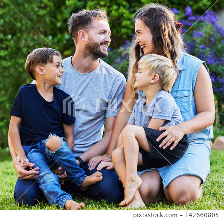 Backyard, mother and father with kids in together as family outdoor for bonding, happy and laughing. Parents, children and hug with boys in garden at home for connection, love and support in park 142660805