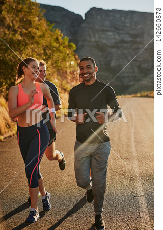 People, group and mountain running for cardio exercise with friends or morning workout, nature or training. Men, women and marathon practice or fitness community as club for road, support or goals People, group and mountain running for cardio exercise with friends or morning workout, nature or training. Men, women and marathon practice or fitness community as club for road, support or goals 142660878