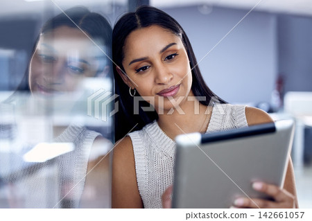 Tablet, woman and research at night for business, happy and working in office after hours. Technology, internet and smile with female employee, online and searching for new project information Tablet, woman and research at night for business, happy and working in office after hours. Technology, internet and smile with female employee, online and searching for new project information 142661057