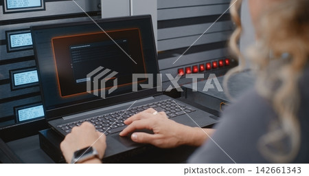 Female IT Specialist Responding to Cyber Attack Through Linux Command Line Female IT Specialist Responding to Cyber Attack Through Linux Command Line 142661343