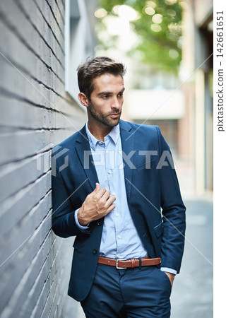 Businessman, fashion and wall with suit and confidence for career, clothing or trendy and cool. Male lawyer, city background and stylish or formal for job in corporate, legal with hands in Boston Businessman, fashion and wall with suit and confidence for career, clothing or trendy and cool. Male lawyer, city background and stylish or formal for job in corporate, legal with hands in Boston 142661651