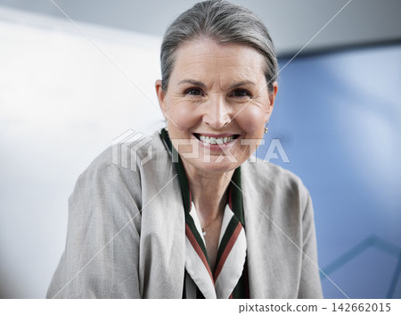 Portrait, smile and mature businesswoman in boardroom, happy and professional in office workshop. Management, ceo or executive for corporate sales manager, face and mentor for brainstorming Portrait, smile and mature businesswoman in boardroom, happy and professional in office workshop. Management, ceo or executive for corporate sales manager, face and mentor for brainstorming 142662015