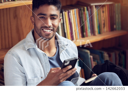 Shelf, library and portrait for phone, man and student in college of Massachusetts, knowledge and information. University, campus and person with mobile, internet and research for assignment in app Shelf, library and portrait for phone, man and student in college of Massachusetts, knowledge and information. University, campus and person with mobile, internet and research for assignment in app 142662033