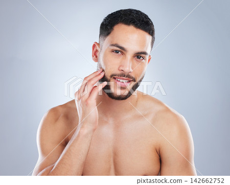 Skincare, beauty and portrait of man in studio with wellness, cosmetics and facial treatment. Aesthetic, dermatology and face of person with healthy skin, confidence and glow on white background Skincare, beauty and portrait of man in studio with wellness, cosmetics and facial treatment. Aesthetic, dermatology and face of person with healthy skin, confidence and glow on white background 142662752