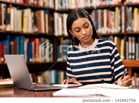 Student, laptop and girl in library, writing and research for project, university and education. Person, college and woman with computer, books and learning with scholarship, creativity and studying Student, laptop and girl in library, writing and research for project, university and education. Person, college and woman with computer, books and learning with scholarship, creativity and studying 142662756