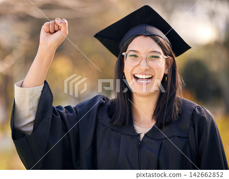 Success, college portrait and woman for graduation with celebration, scholarship and milestone for university. Female graduate, smile and hand with power emoji in campus for achievement and education Success, college portrait and woman for graduation with celebration, scholarship and milestone for university. Female graduate, smile and hand with power emoji in campus for achievement and education 142662852