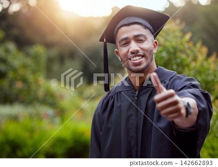 Thumbs up, graduate and portrait outdoor for celebration, achievement and education or ceremony. Person, happy and proud in gown or robe for university event, student success and scholarship award Thumbs up, graduate and portrait outdoor for celebration, achievement and education or ceremony. Person, happy and proud in gown or robe for university event, student success and scholarship award 142662893