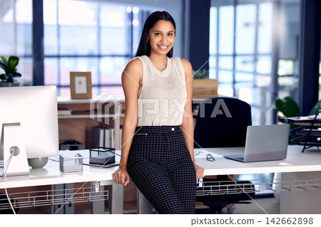Design, portrait and smile of business indian woman in office at night for project management. Administration, desk and mission with confident employee in creative agency or workplace for development Design, portrait and smile of business indian woman in office at night for project management. Administration, desk and mission with confident employee in creative agency or workplace for development 142662898