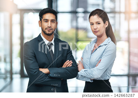 Portrait, confident and team of business people together in office for cooperation, corporate or about us. Serious face, staff or employee with arms crossed for solidarity or collaboration of advisor Portrait, confident and team of business people together in office for cooperation, corporate or about us. Serious face, staff or employee with arms crossed for solidarity or collaboration of advisor 142663287