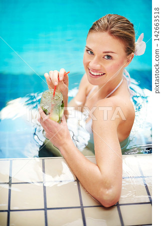 Woman, cocktail and swimming pool for holiday, vacation or tropical vacation with summer drink. Excited portrait of tourist at hotel with mojito, lime and alcohol in glass for outdoor break or relax Woman, cocktail and swimming pool for holiday, vacation or tropical vacation with summer drink. Excited portrait of tourist at hotel with mojito, lime and alcohol in glass for outdoor break or relax 142663518