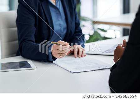 Meeting, client and hands of lawyer with paperwork, contract or negotiation of document or policy. People, planning or writing agreement terms and conditions of deal or trust attorney with legal info Meeting, client and hands of lawyer with paperwork, contract or negotiation of document or policy. People, planning or writing agreement terms and conditions of deal or trust attorney with legal info 142663554