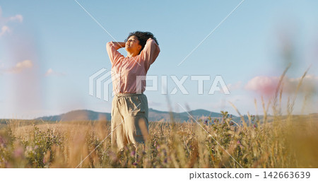 Woman, freedom and dancing in field of flowers, countryside and peace in sustainable environment. Female person, holiday and adventure in nature or outdoors, calm and zen or wellness on vacation Woman, freedom and dancing in field of flowers, countryside and peace in sustainable environment. Female person, holiday and adventure in nature or outdoors, calm and zen or wellness on vacation 142663639