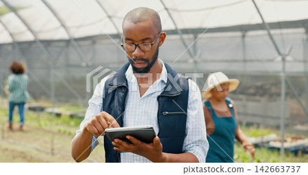 Research, tablet or black man in farm for agriculture or sustainability, production or website info. Business, greenhouse or farmer in countryside for ngo checklist online, agro development or crops Research, tablet or black man in farm for agriculture or sustainability, production or website info. Business, greenhouse or farmer in countryside for ngo checklist online, agro development or crops 142663737