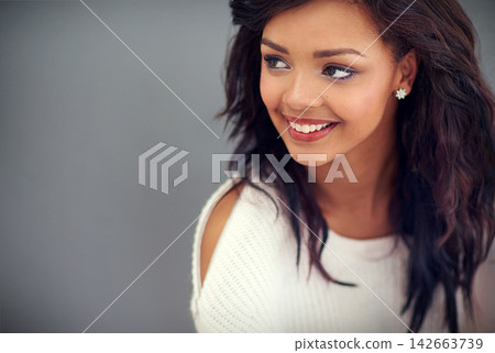 Smile, thinking and black woman with ideas, fashion and confidence on grey studio background. African person, girl and model with choice, happy and stylish clothes with decision, question or planning Smile, thinking and black woman with ideas, fashion and confidence on grey studio background. African person, girl and model with choice, happy and stylish clothes with decision, question or planning 142663739