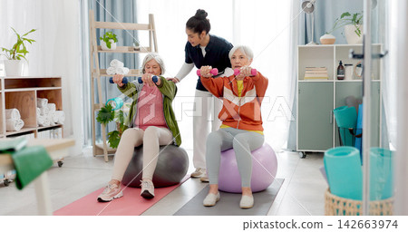 Senior people, fitness class and coach with tablet, ball and dumbbell for muscle health support or balance. Exercise, training and workout woman and personal trainer in pilates class helping clients Senior people, fitness class and coach with tablet, ball and dumbbell for muscle health support or balance. Exercise, training and workout woman and personal trainer in pilates class helping clients 142663974