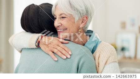 Happy senior woman, hug and elderly care for thank you, gratitude or support for caregiver at home. Mature female person or patient embracing medical or healthcare worker in trust, happiness or house 142663975