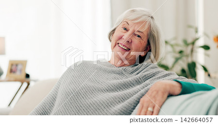 Face, funny and senior woman on couch, home and happiness with retirement, relax and cheerful. Portrait, elderly lady and female person on a sofa, laughing and humor with joy, apartment and peace Face, funny and senior woman on couch, home and happiness with retirement, relax and cheerful. Portrait, elderly lady and female person on a sofa, laughing and humor with joy, apartment and peace 142664057
