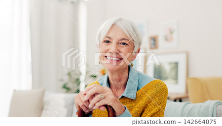 Happy, face and senior woman on sofa in nursing home or grandma with happiness or freedom in retirement to relax in house. Portrait, elderly person and smile in living room or thinking of good memory Happy, face and senior woman on sofa in nursing home or grandma with happiness or freedom in retirement to relax in house. Portrait, elderly person and smile in living room or thinking of good memory 142664075