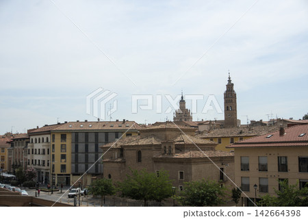 Brick domes of a historic church in Tarazona with the cathedral towers behind Brick domes of a historic church in Tarazona with the cathedral towers behind 142664398
