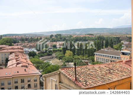 Panorama of Tarazona with the riverside park and a wind farm on the ridge behind Panorama of Tarazona with the riverside park and a wind farm on the ridge behind 142664403